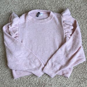 Small pink cropped sweater by Divided.